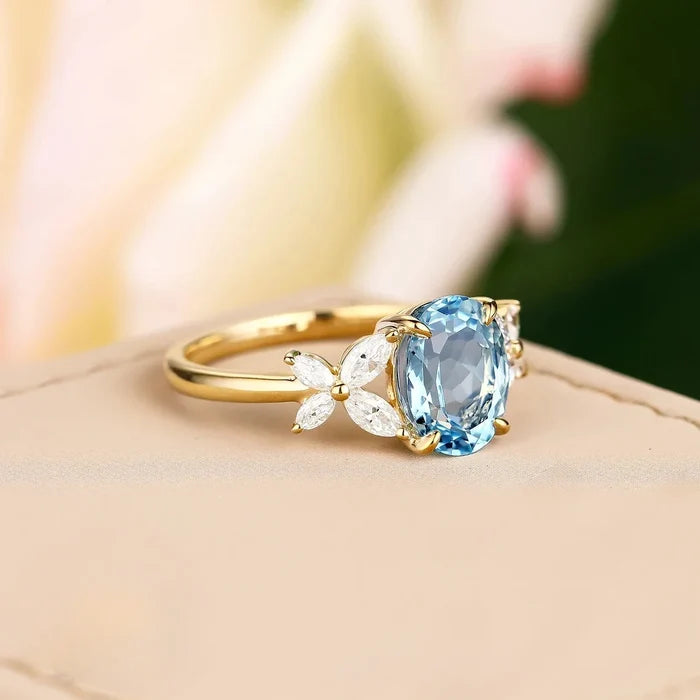 Blue Oval Crystal Cluster Ring | Gold-Tone Floral Accent Band