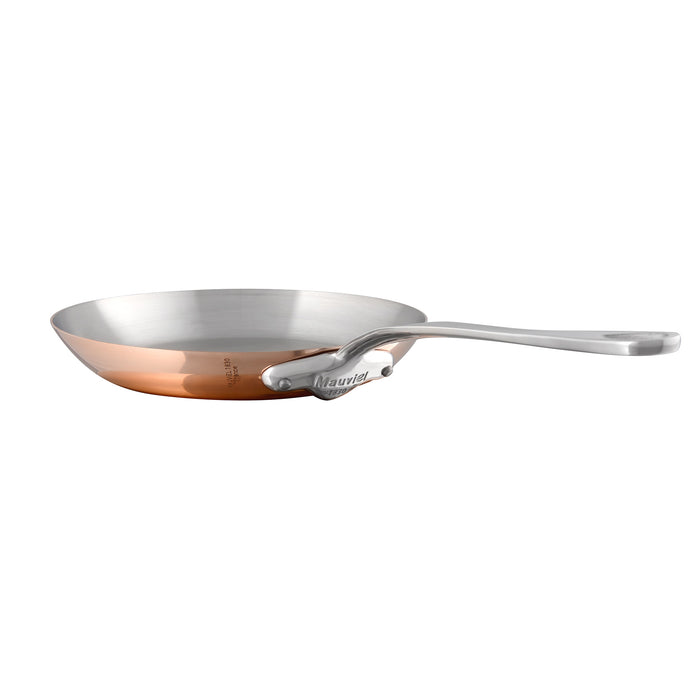 Mauviel M'3 S copper frying pan with cast stainless steel handle, showcasing its polished copper surface and sturdy handle.