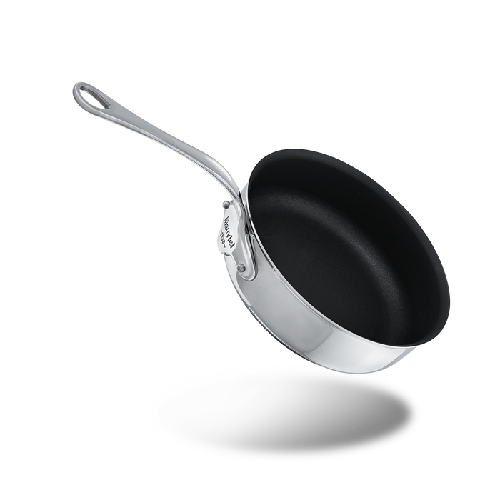 Mauviel M'COOK 5-ply nonstick saute pan with cast stainless steel handle, shown from top view, ideal for sautéing and cooking.