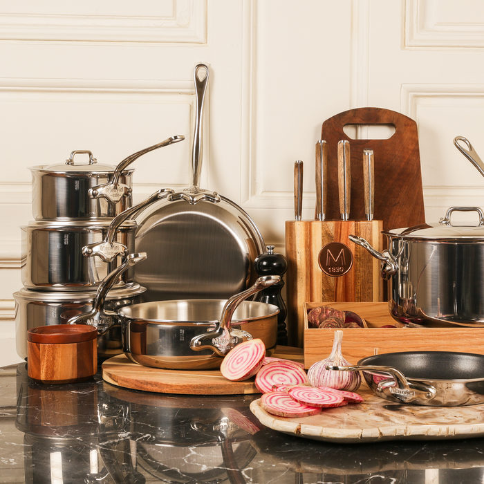 Mauviel M'COOK 1.1-quart 5-ply stainless steel sauté pan with lid and cast stainless steel handle, shown from top angle