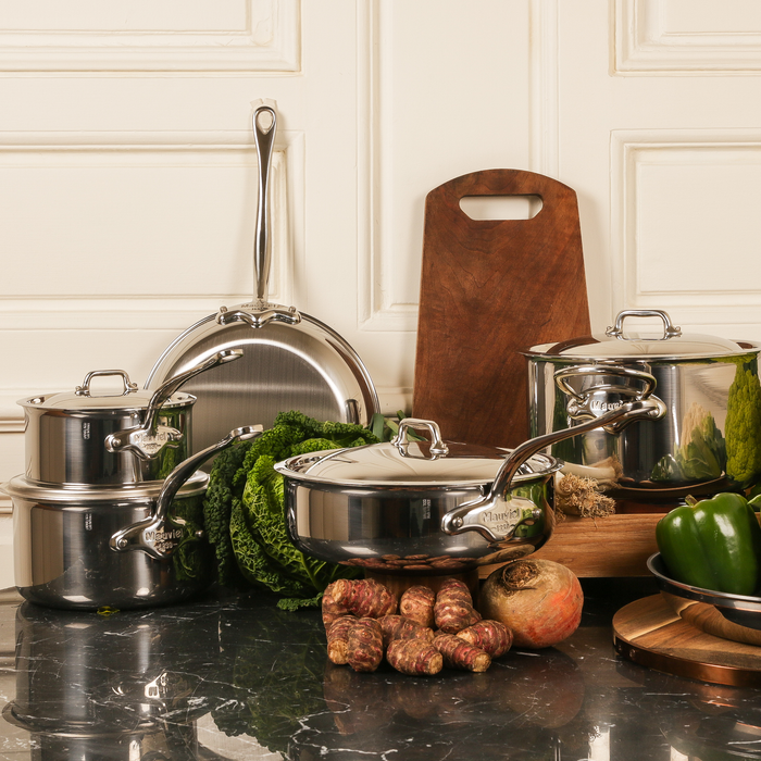 Mauviel M'COOK 5-ply stainless steel sauté pan with lid and cast stainless steel handle, 1.1-quart capacity.