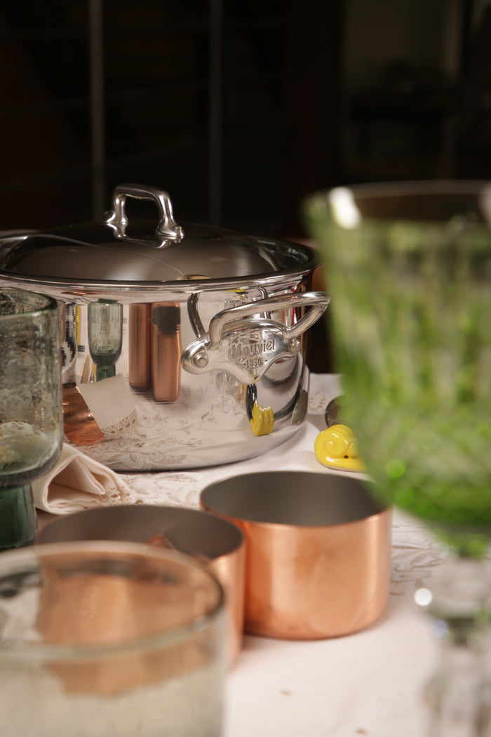 Mauviel M'COOK 5-ply stainless steel stewpan with lid, cast stainless steel handles, ideal for cooking and simmering.
