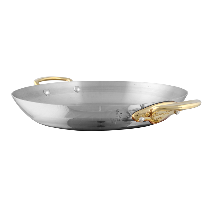 Mauviel M'COOK 5-Ply round gratin pan with brass handles, stainless steel frying pan for versatile cooking and browning.