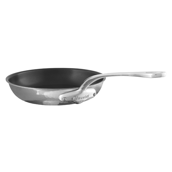 Mauviel M'ELITE hammered 5-ply nonstick frying pan with cast stainless steel handle, shown with a smooth cooking surface.