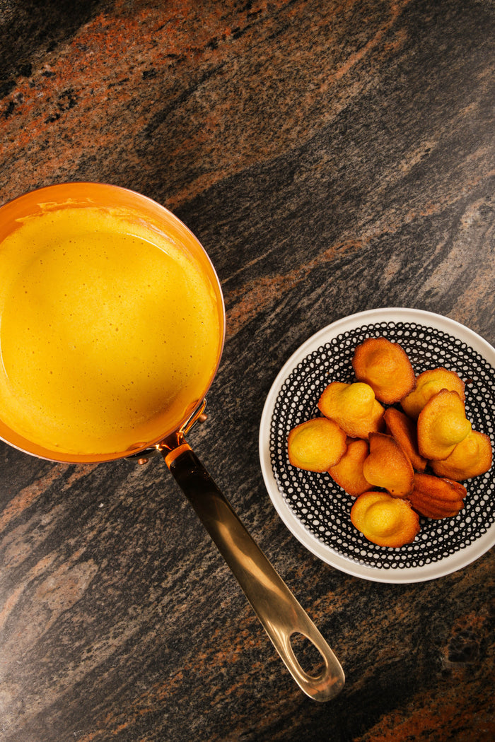 Mauviel M'PASSION copper zabaglione pot with brass handles, specialty cookware for making traditional Italian desserts.