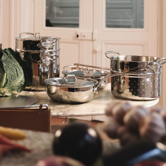 Mauviel M'URBAN 4 Tri-Ply stainless steel sauce pan with cast stainless steel handle, side view showing polished finish